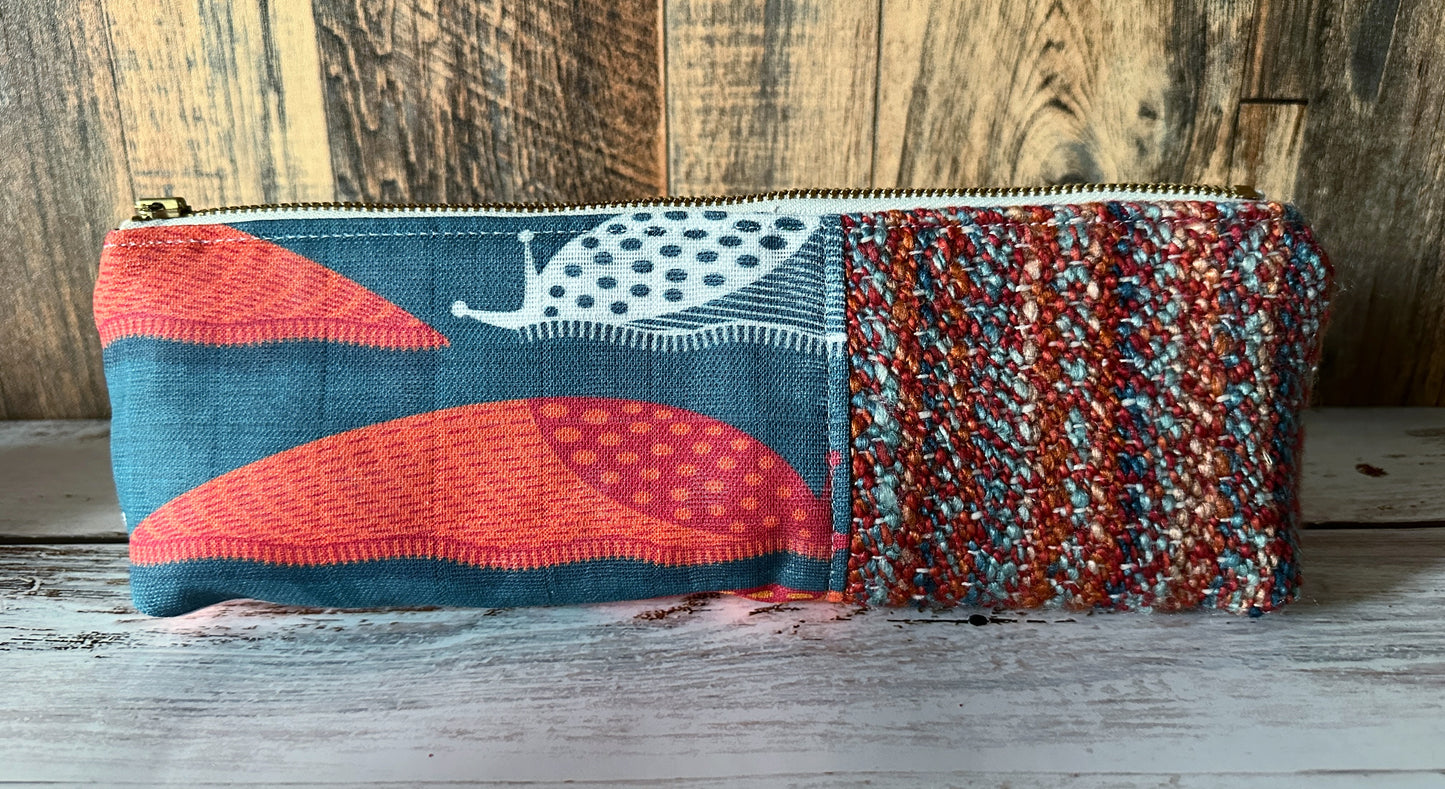 Slug Parade with Handwoven Wool Long and Lean Zipper Bag