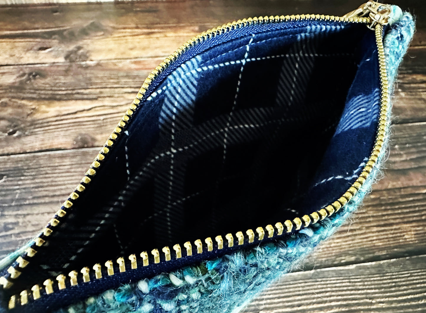 Resist Fists with Handwoven Wool Zipper Bag