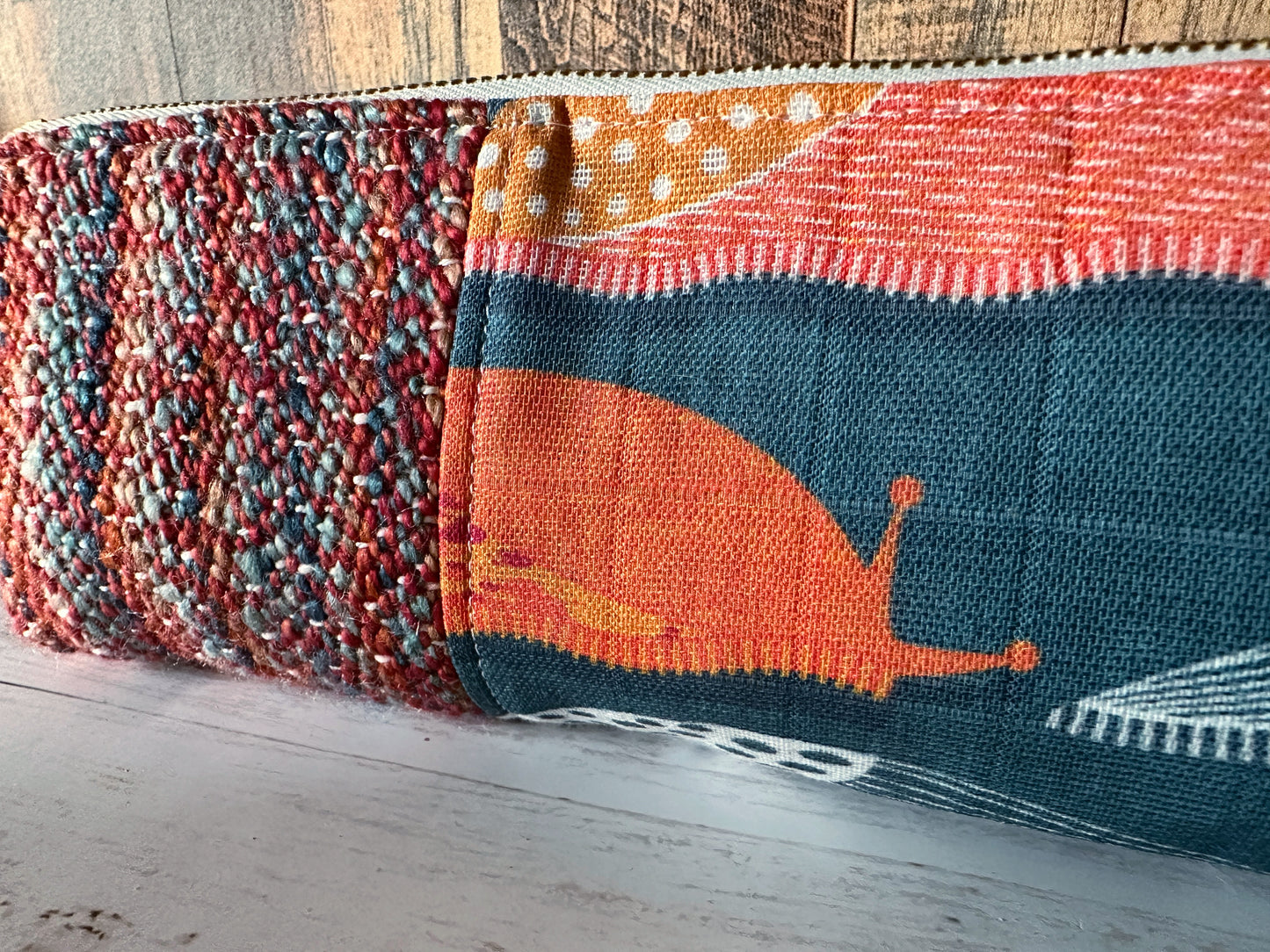Slug Parade with Handwoven Wool Long and Lean Zipper Bag