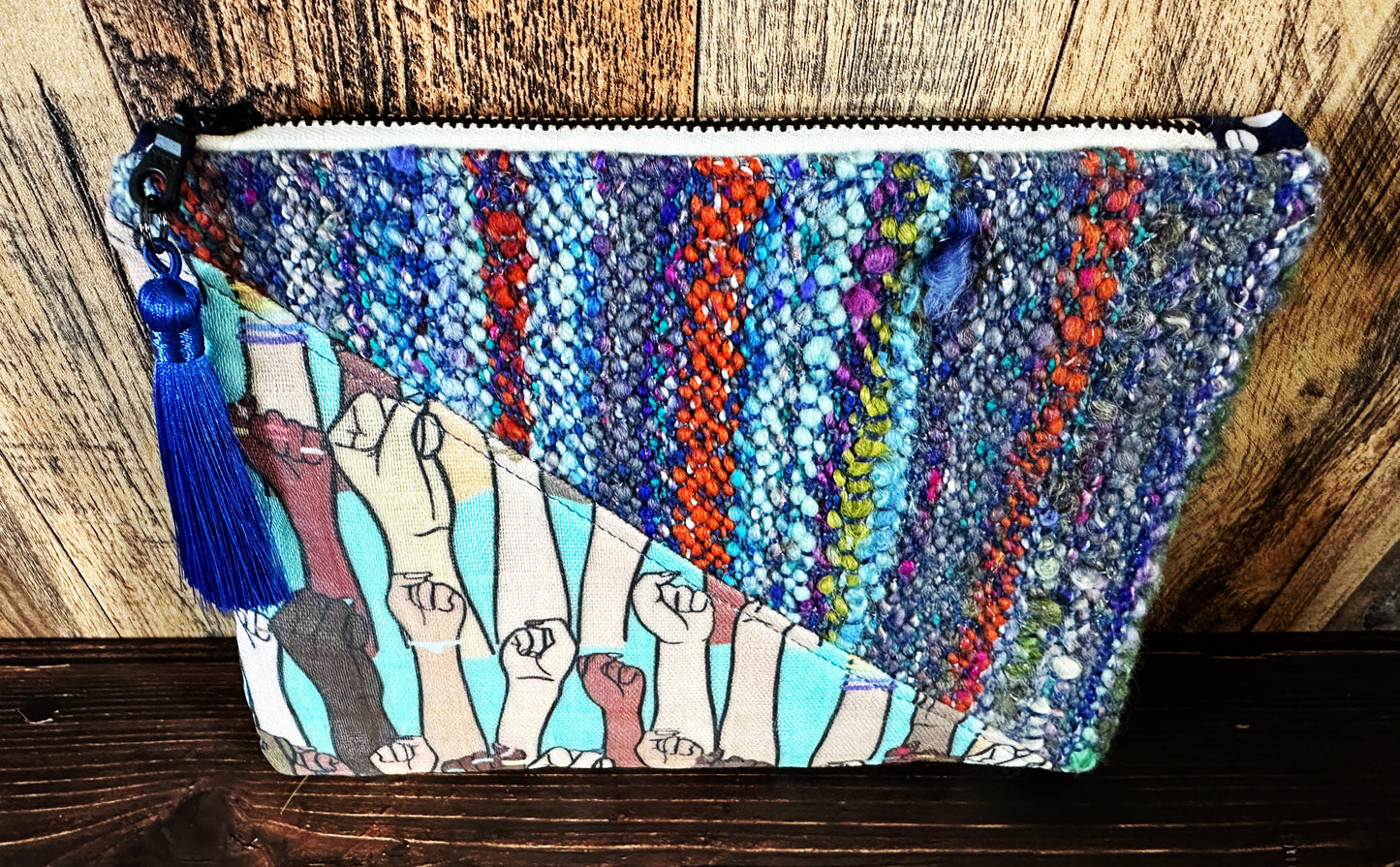 Resist Fists with Handwoven Wool Zipper Bag