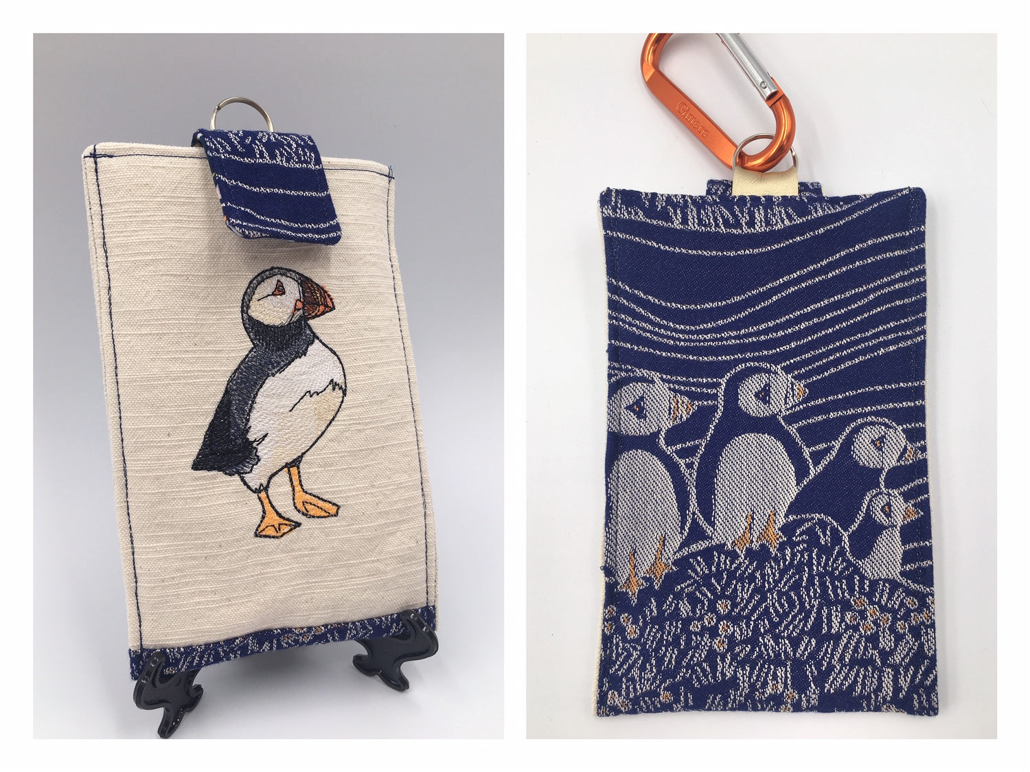 Image of a phone pouch with internal card pocket and belt clip. It features Puffins fabric from Oscha Slings and elegant and realistic puffin embroidery from Urban Threads. 